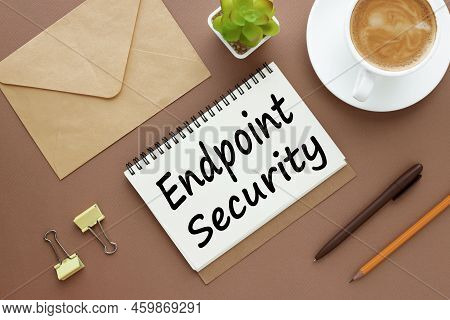 Endpoint Security - Business Concept, Flat Lay, Coffee Cup, Envelope. Text On Notepad Page