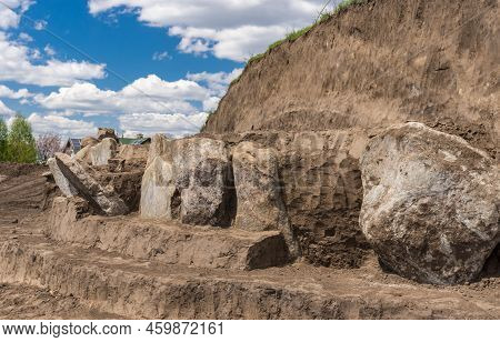 Landscape With Excavations Place Of Granite Gravestone Plates In Ancient Burial Mound In Novooleksan