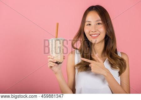 Asian Beautiful Young Woman Holding Drinking Brown Sugar Flavored Tapioca Pearl Bubble Milk Tea And 