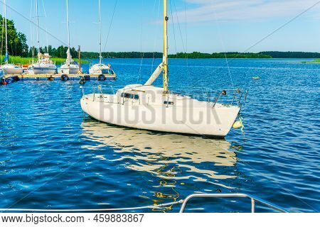 White Yacht With The Blue Sea Water At Summer Day.plateliai,lithuania.08-03-2022.