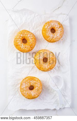 Cronuts - Delicious Fusion Of Croissant And Donut. Half-donut And Half-croissant Pastry