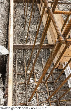Reinforcement Covered With Earth During Formwork Collapse