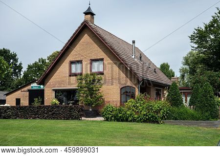 Harskamp, Gelderland, The Netherlands - 07 14 2022 - Country House With Front Yard, Surrounded By Tr