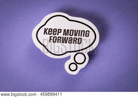 Keep Moving Forward. Text And Speech Bubble On Purple Background