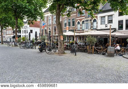 Zaltbommel, Gelderland, The Netherlands - 07 12 2022 - People Sitting On Sunny Terraces In Old Town
