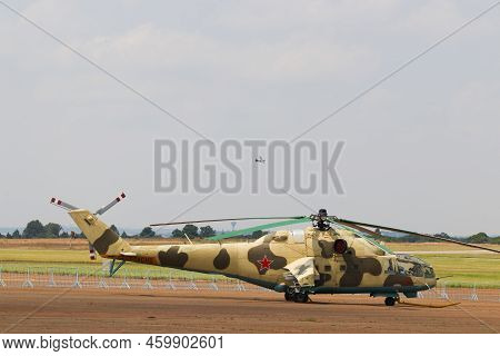 Russian Military Gunship Helicopter Parked At Airfield