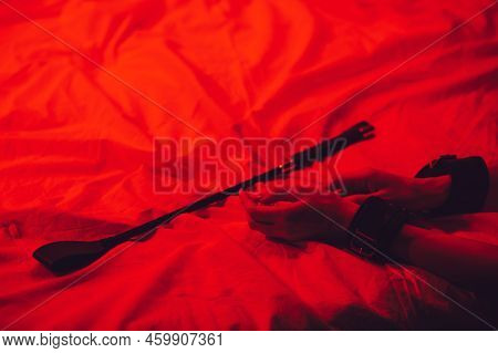 Girl Hands In Handcuffs And Leather Whip Flogger For Bdsm Sex With Submission And Domination Lie On 