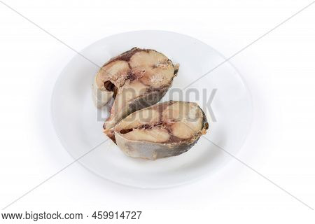 Baked Pieces Of The Japanese Amberjack Or Yellowtail On A White Dish On A White Background