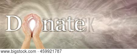 The Effects Of Donating Can Spiral - Female Hands Making The O In Donate Against A Wide Warm Bronze 