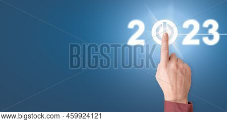 Finger Pressing Start 2023 Button On Virtual Interface. Businessman Pressing 2023 Start Up Business.