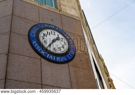 London - May 18, 2022: Clock On Side Of Building On Corner Of The Strand And Bedford Street, Wc2, Lo