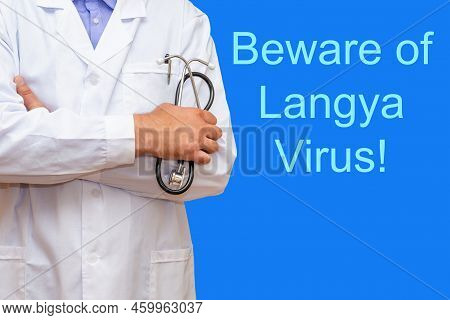 Inscription Beware Of Langya Virus.an Unrecognizable Doctor Stands Nearby.detection Of Layv And Lang