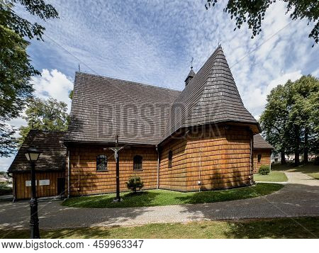 Sanctuary Of Our Lady Of Truskolasy. The Largest Larch Church In Poland (made Of Larch Wood).