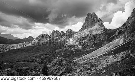 Averau Mountain And Rifugio Averau In Dolomites, Italy. Black And White Image.