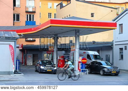 Stockholm, Sweden - August 22, 2018: Drivers Fill Cars At Circle K Brand Gas Station In Downtown Sto