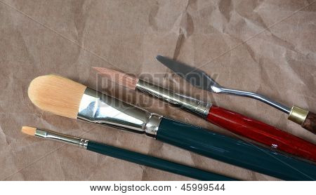 Three Brushes And Palette Knife