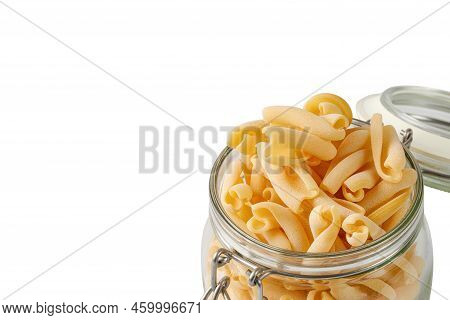 Maccheroni, Maccheroncini. Italian Homemade Pasta In Glass Jar 
Isolated On White Background. Close 