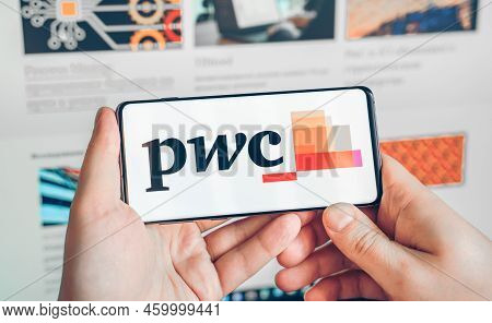 Russia Moscow 25.12.2021 Logo Of Pwc Ar Experience Metaverse.man Playing Blockchain Nft Ethereum Cry