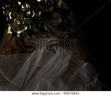 Beautiful woman with red hair wearing vintage hat