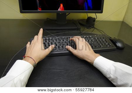 Self Point Of View Of Hands Typing On Computer Keyboard