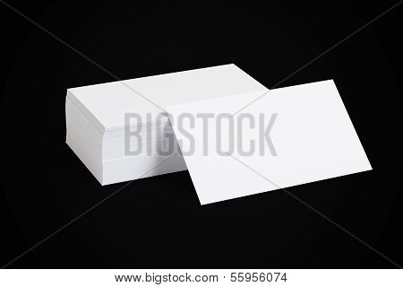 Stack Of Blank White Businesscards On Black Background