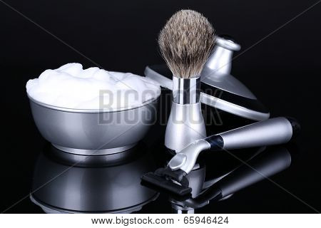 Male luxury shaving kit isolated on black