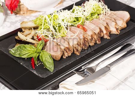 plate of meat and vegetables