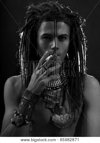 Black And White Profile Portrait Of A Young Man With Dreadlocks