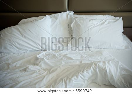 Empty Unmade Bed
