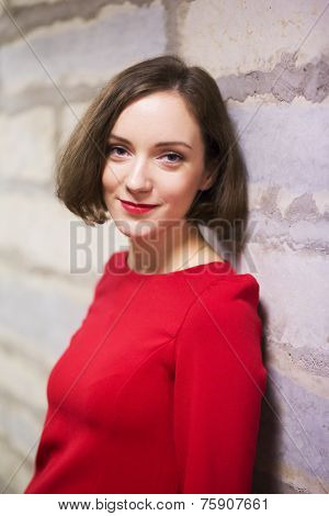 Woman In Hallway And Limestone Wall Bricks