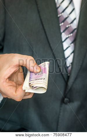 Businessman Giving A Bribe