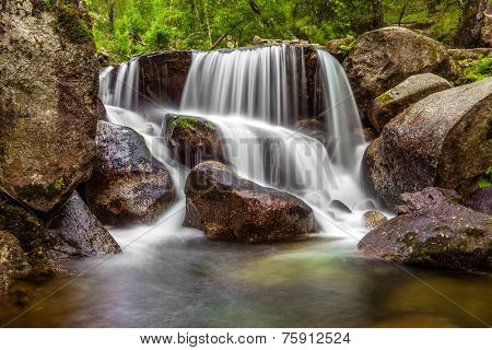 Close-up of a waterfall during the autumn near the Queimadela Dam in the Municipality of Fafe. Portugal