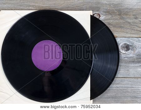 Stack Of Old Music Records On Aged Wood