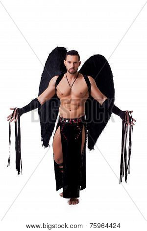 Male stripteaser dressed in suit of fallen angel