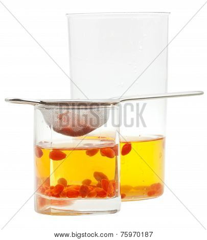 Side View Of Pot And Glass Goji Berries Tincture