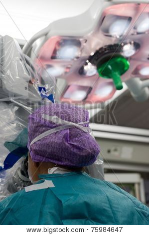 Surgeon Operating In Hospital