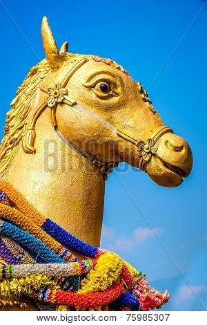 A golden horse statue