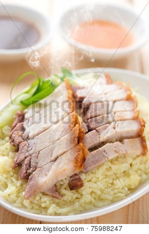 Chinese crispy roasted belly pork rice. Fresh cooked with hot steam and smoke.