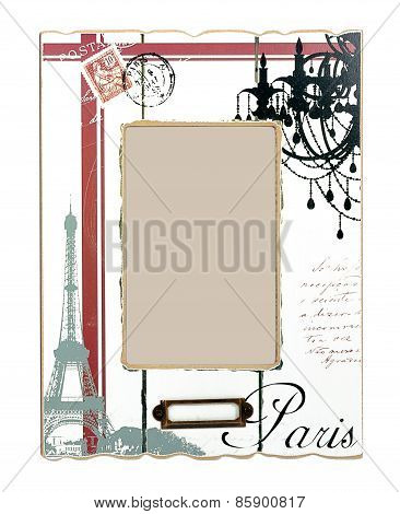 White aged photo frame with drawings of Eiffel Tower and black word Paris. Isolated place for your p