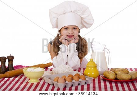 Cute little baby dressed as a cook, isolated on white background