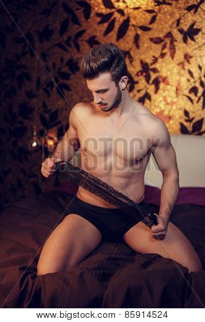 Sexy Macho Man Playing With Lace Eye Cover