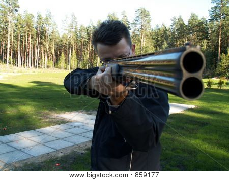 Muž s pistolí