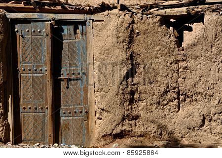 Old Door On A Village House