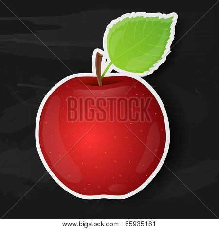 Red apple isolated on black background.