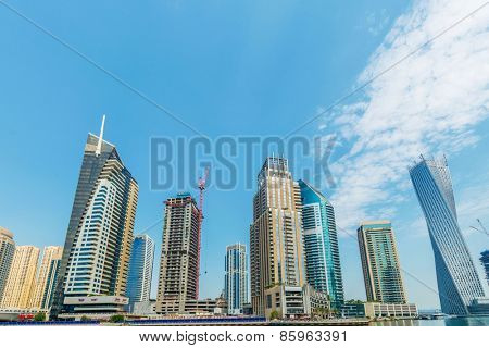 Dubai - AUGUST 9, 2014: Dubai Marina district on August 9 in UAE, Dubai. Dubai Marina district is a popular residential and business area.
