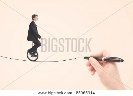 Businessman riding monocycle on a rope drawn by hand concept