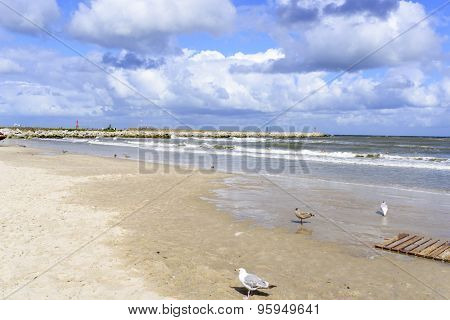 Baltic sea beach on a stormy summer day in Ustka, Poland.