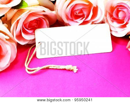 beautiful roses flower on paper texture background with filters color and space for copy