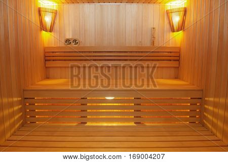 Sauna room with traditional sauna accessories