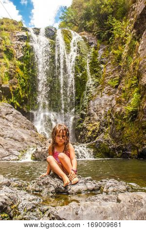 beautiful water fall in forest, new zealand, waipu, piroa falls